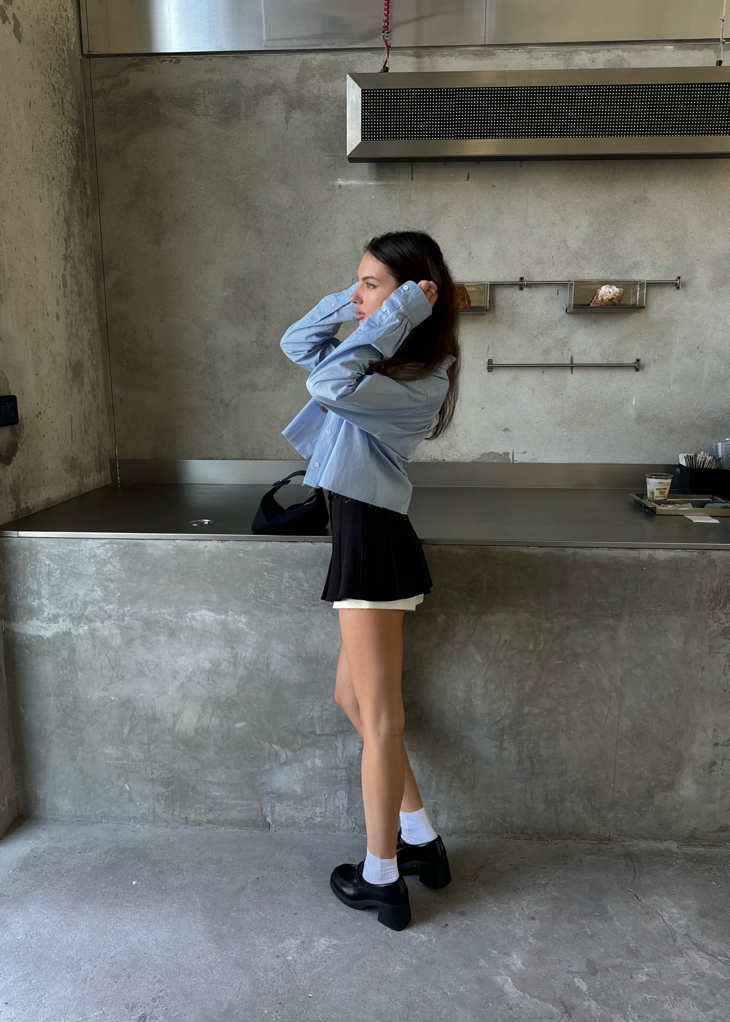 Girl in black shorts