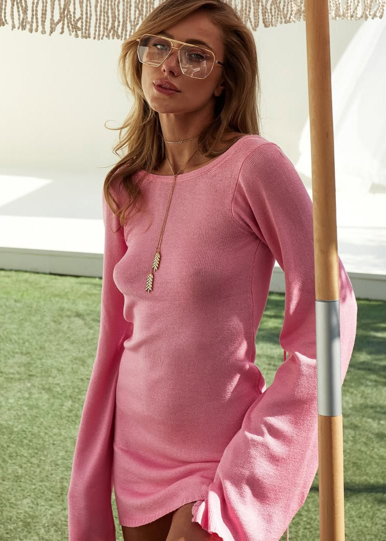 Girl in pink knitted dress
