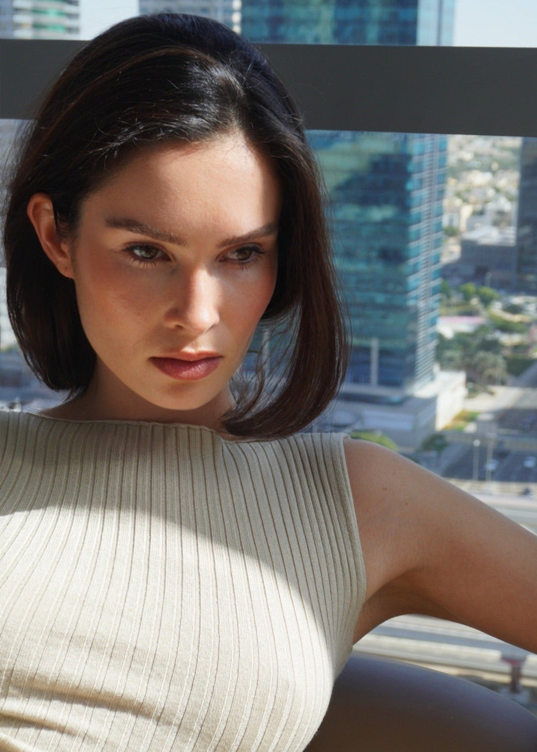 Girl in beige suit, long skirt and top