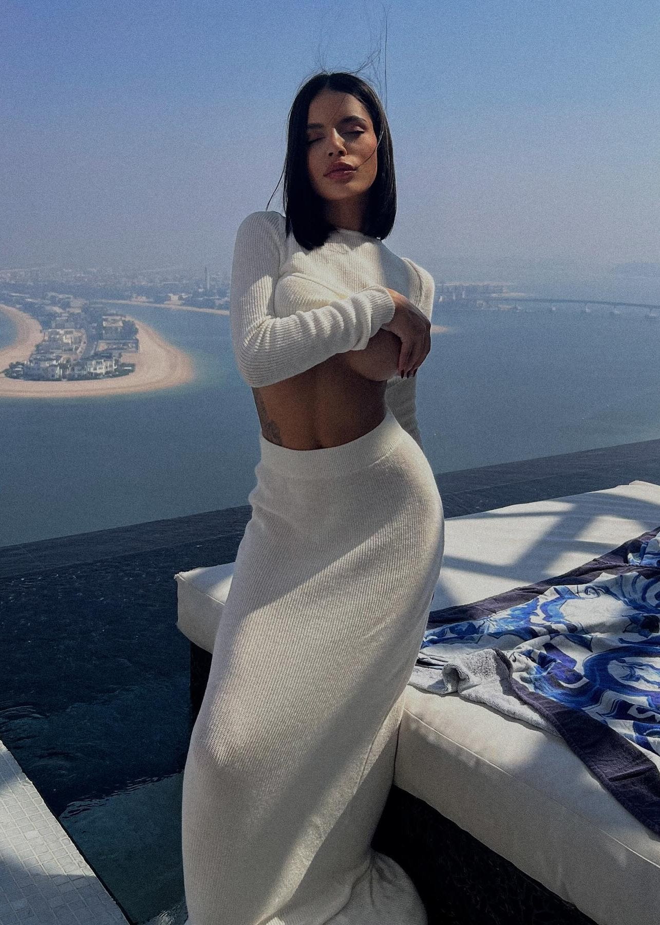 Girl in knitted white suit