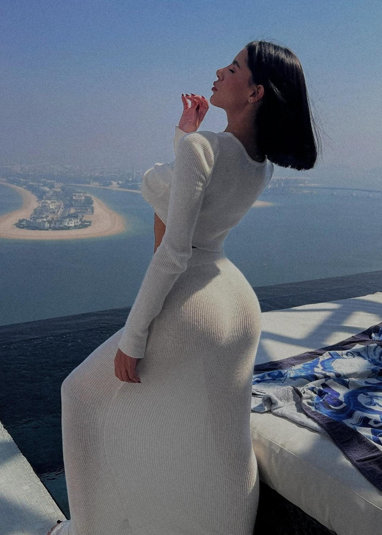 Girl in knitted white suit