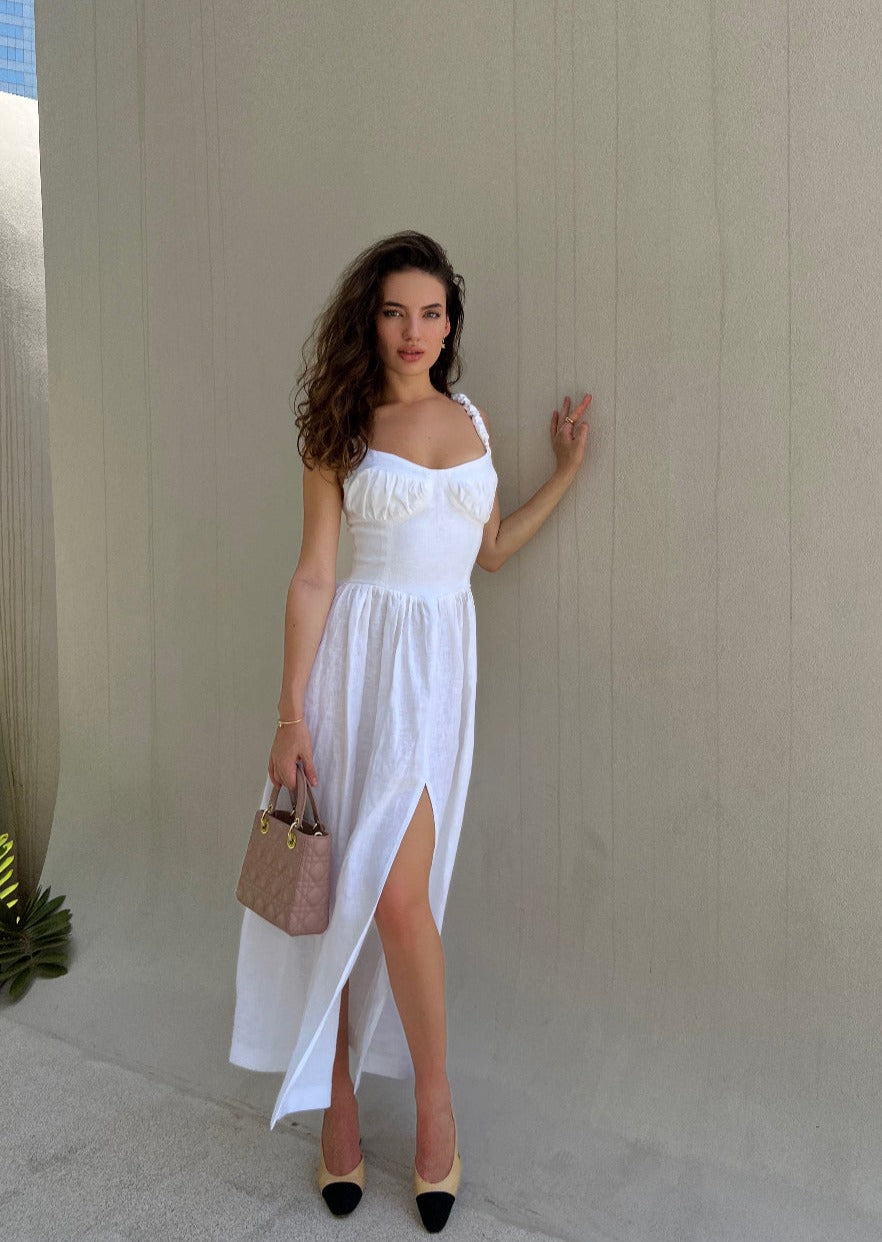 Girl in white linen dress