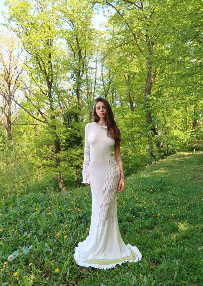 Girl in the long white dress with one sleeve