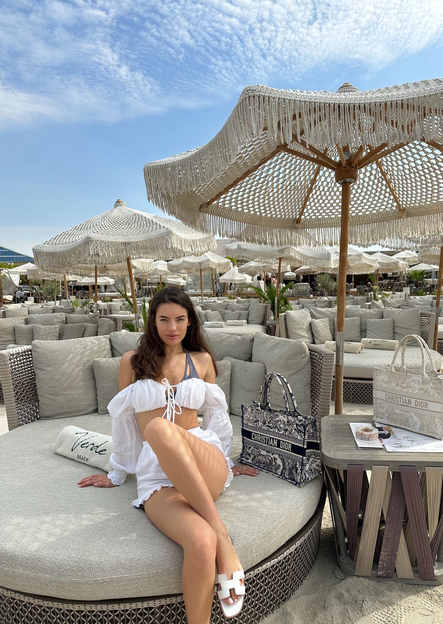 Girl in white shorts and top