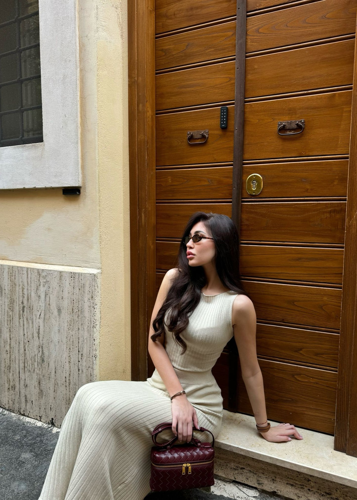 Girl in beige suit, long skirt and top