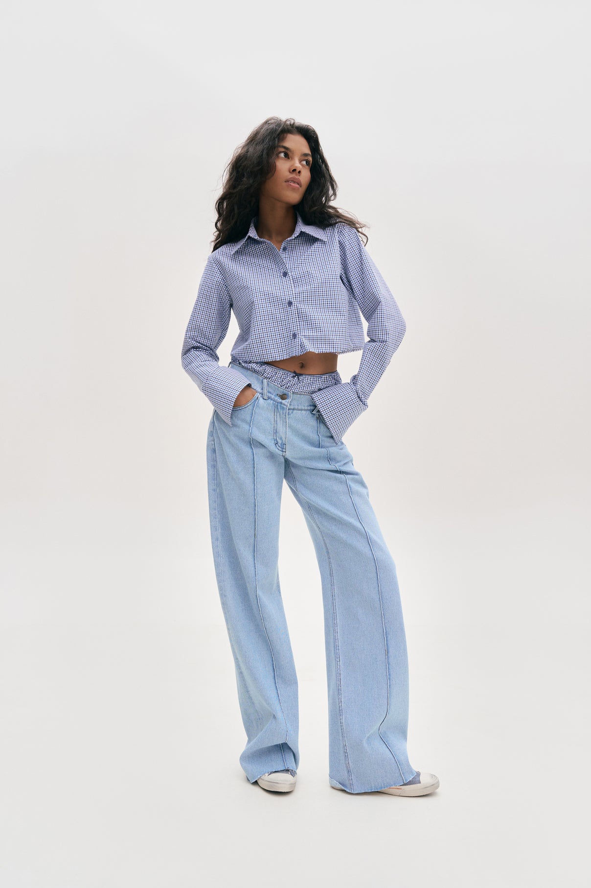 Girl in suit shirt with shorts