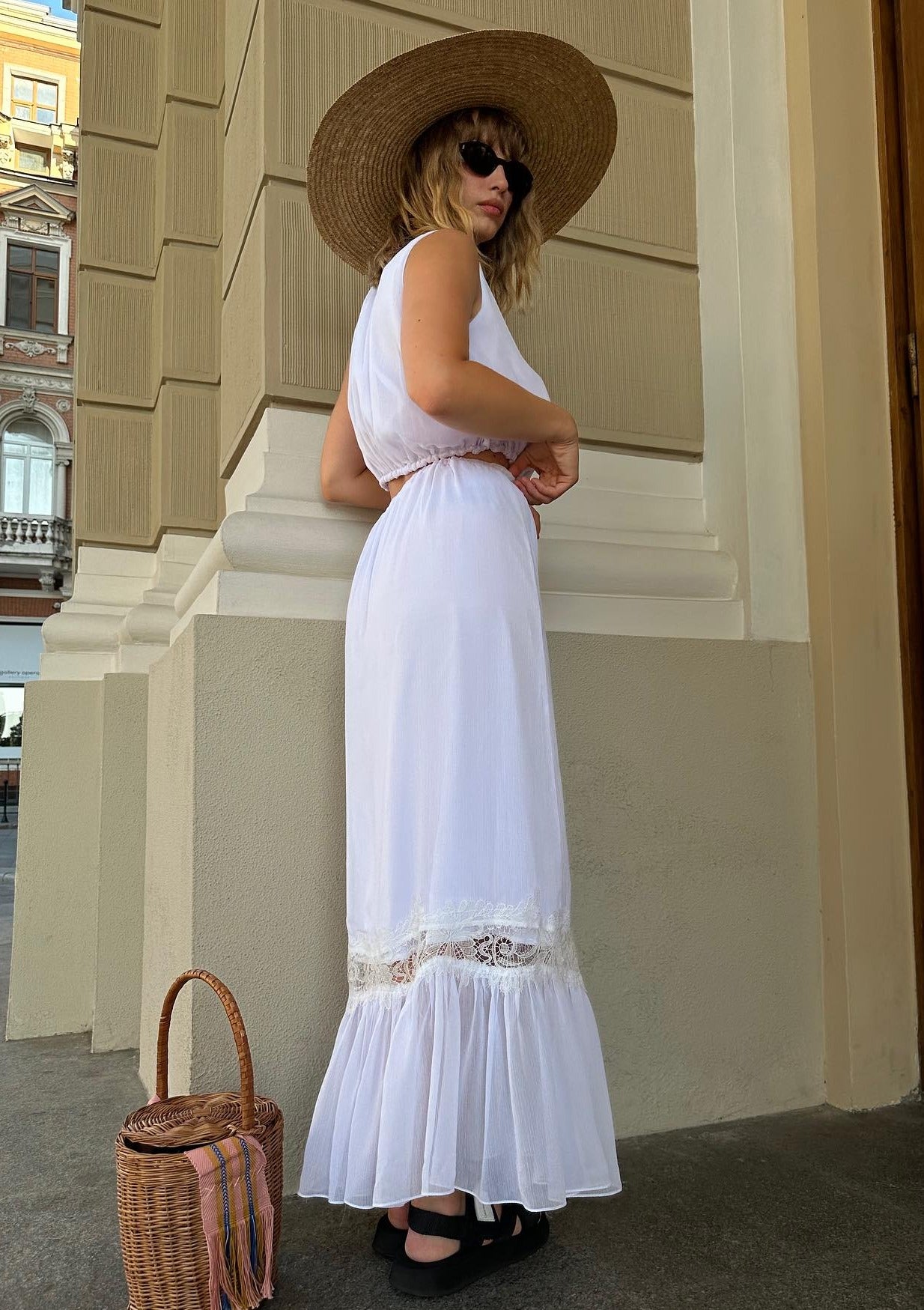 Girl in white chiffon suit with long skirt