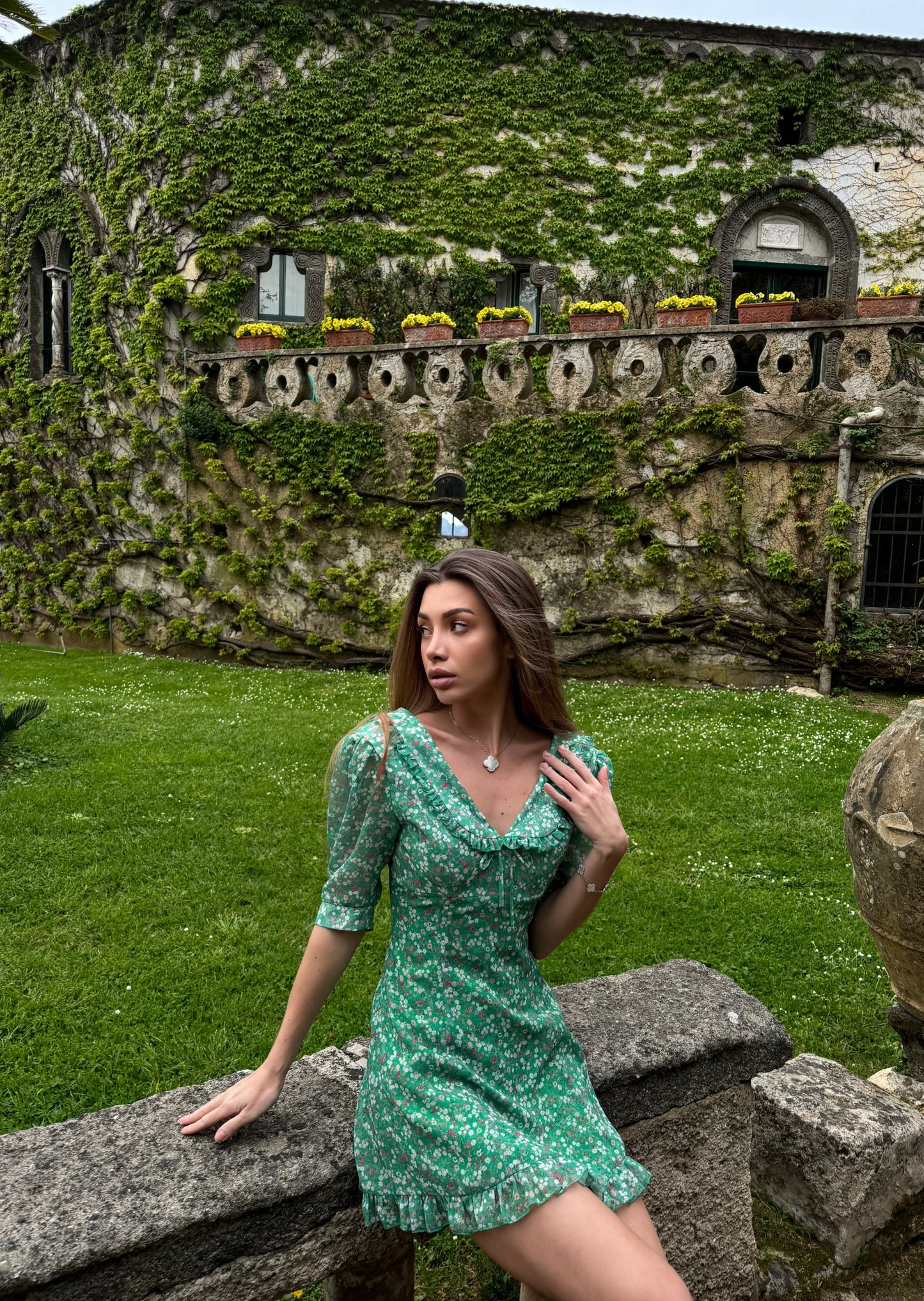 Girl in green dress with flowers