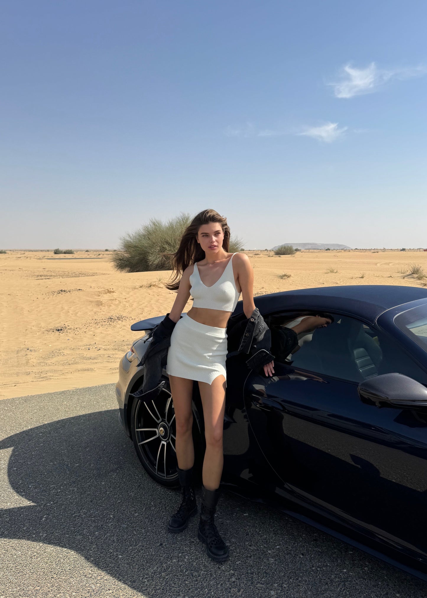 Girl in white suit short skirt and top