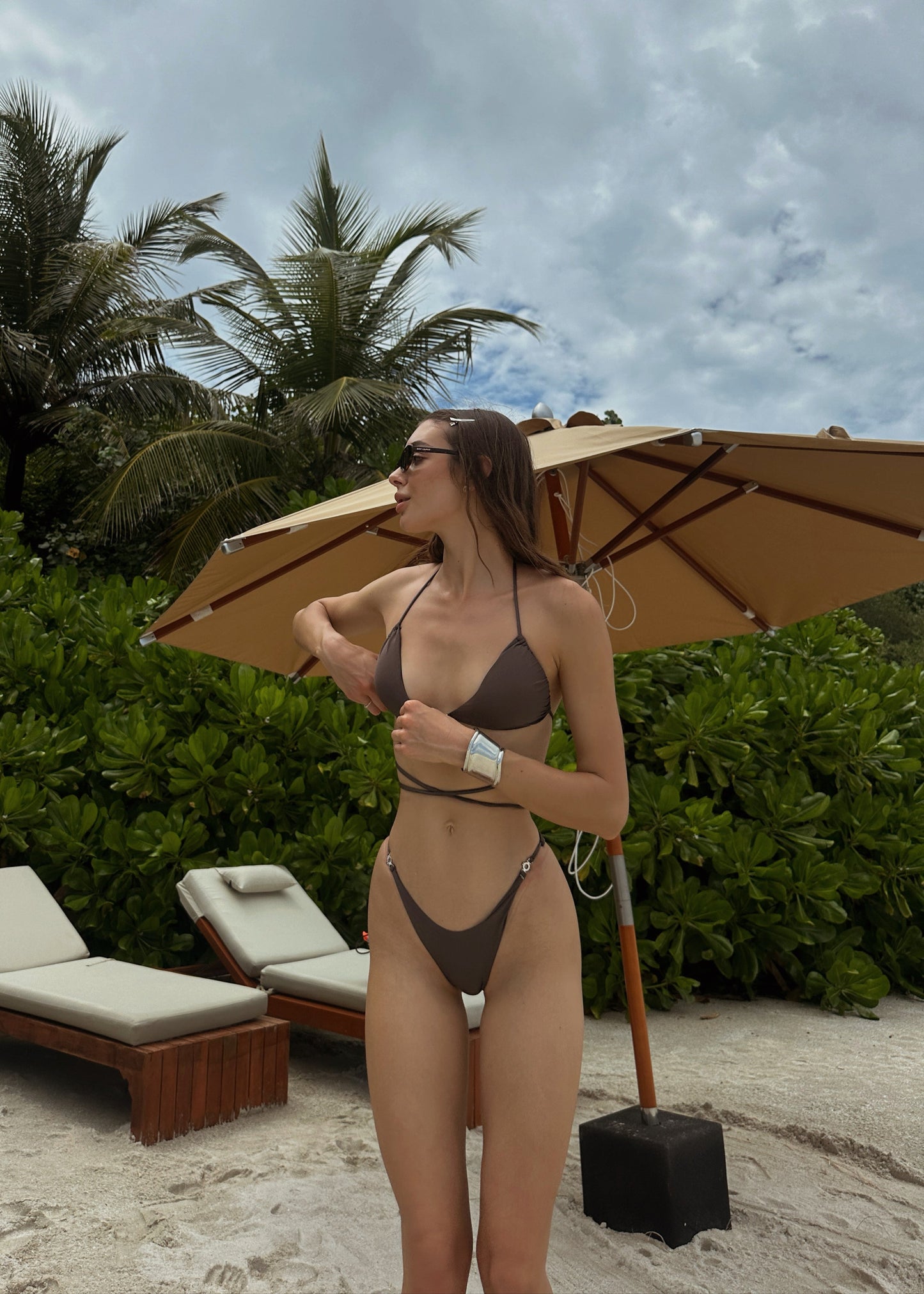 Girl in brown bikini