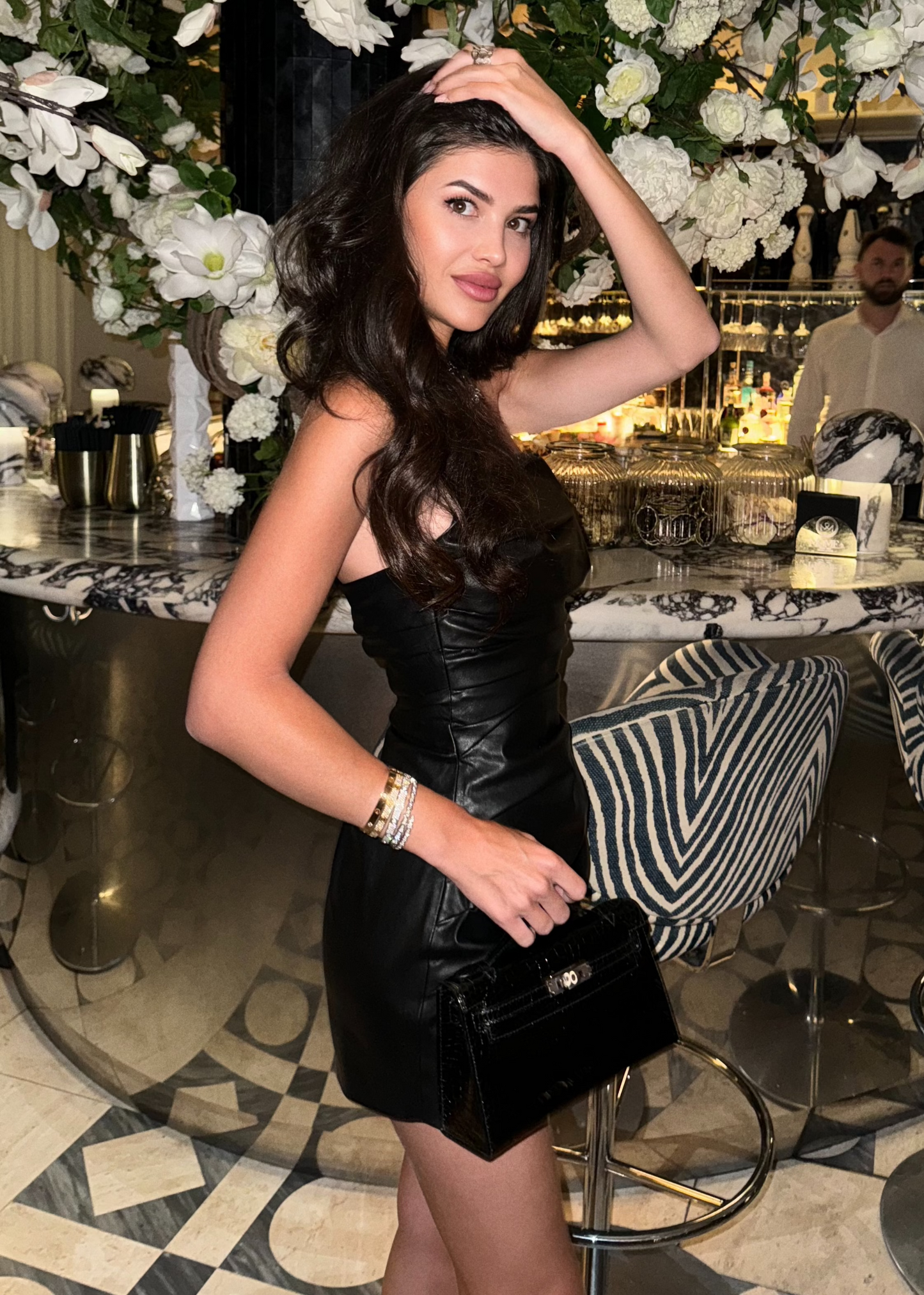 Girl in black leather dress