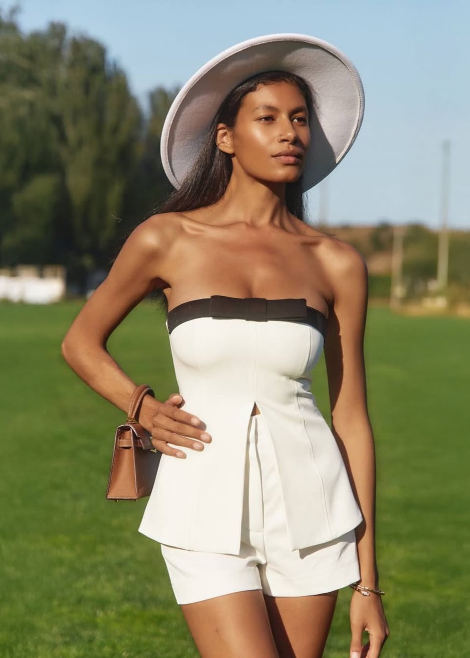 Girl in white suit with shorts