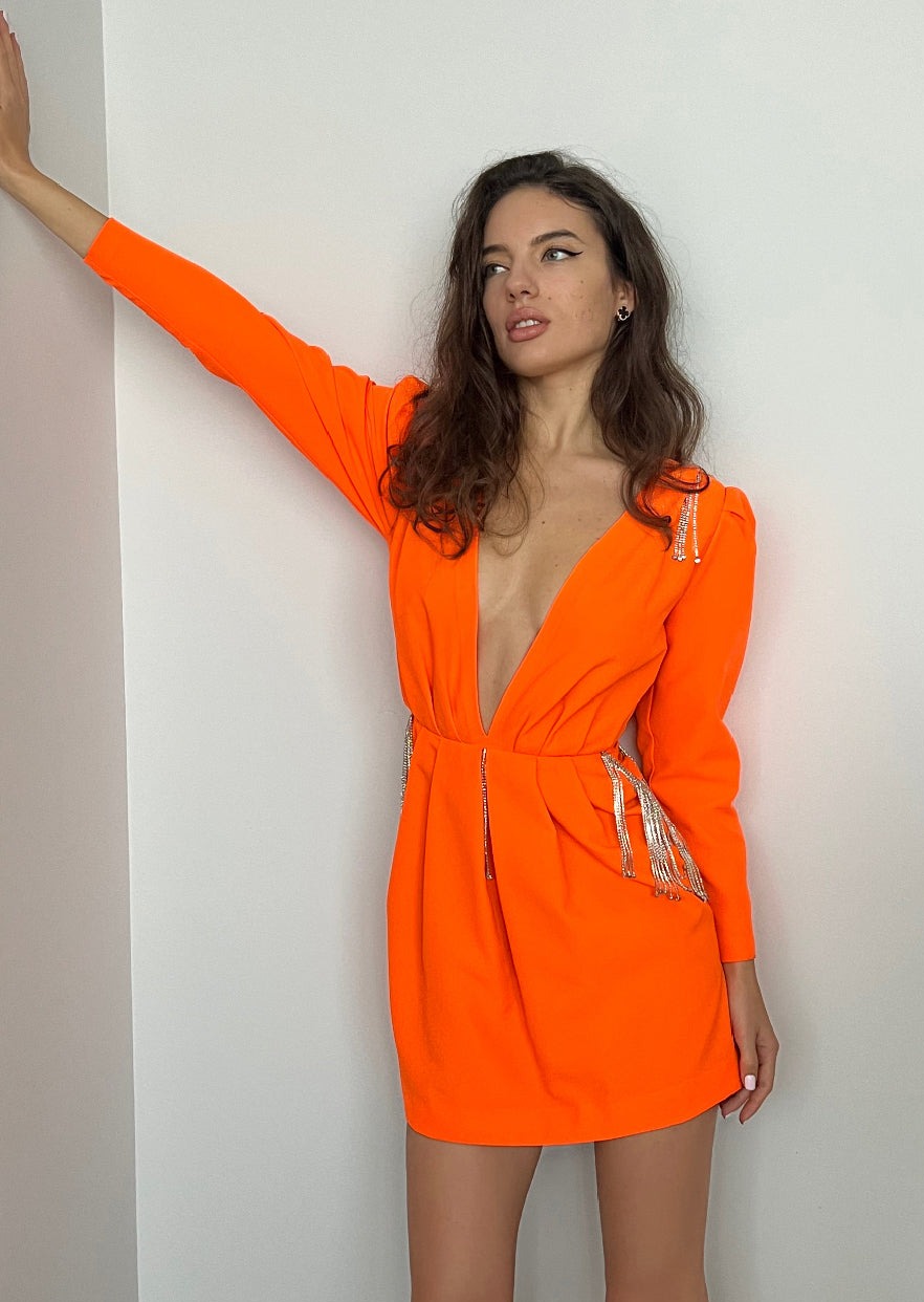 Girl in bright orange dress