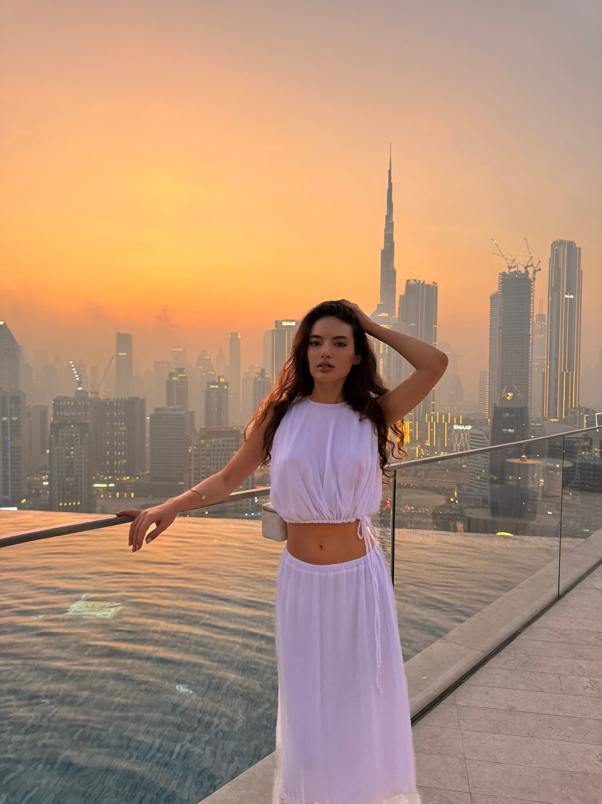 Girl in white chiffon suit with long skirt