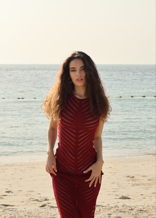 Girl in red  long knitted dress
