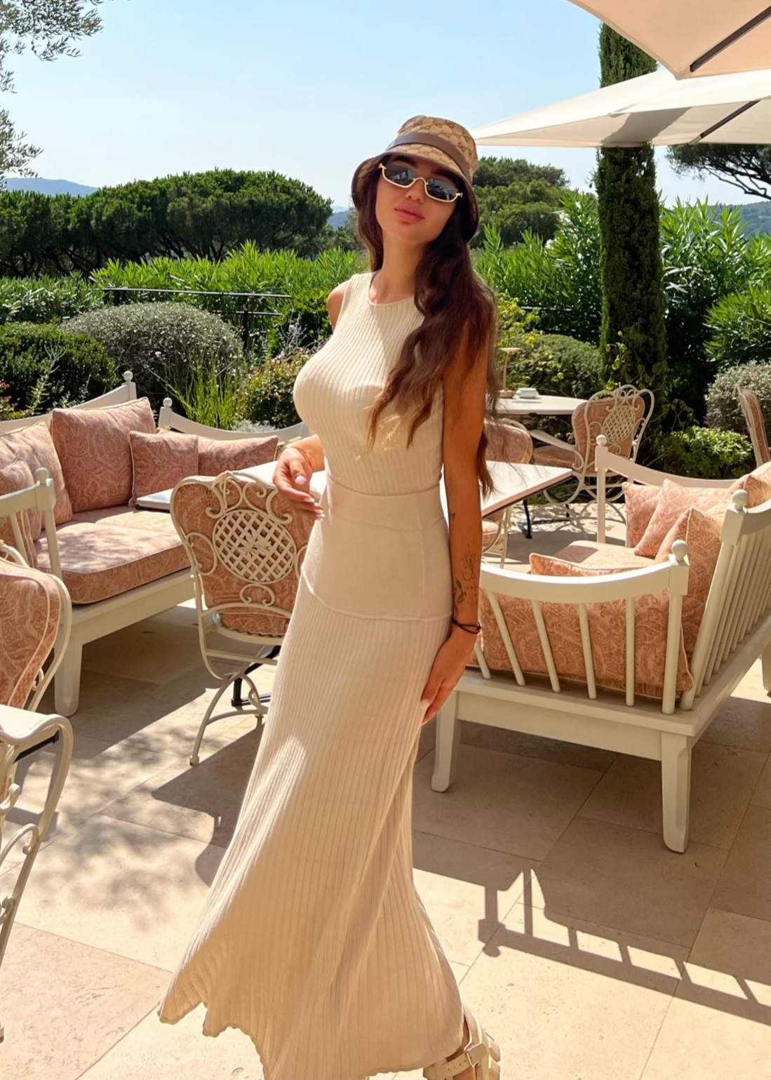 Girl in beige suit, long skirt and top