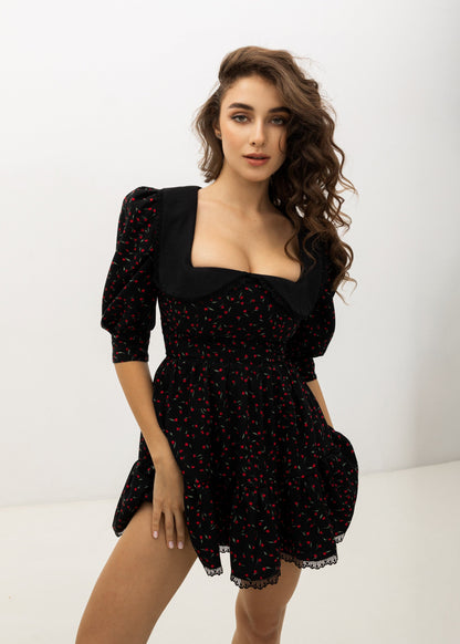 Girl in black floral dress