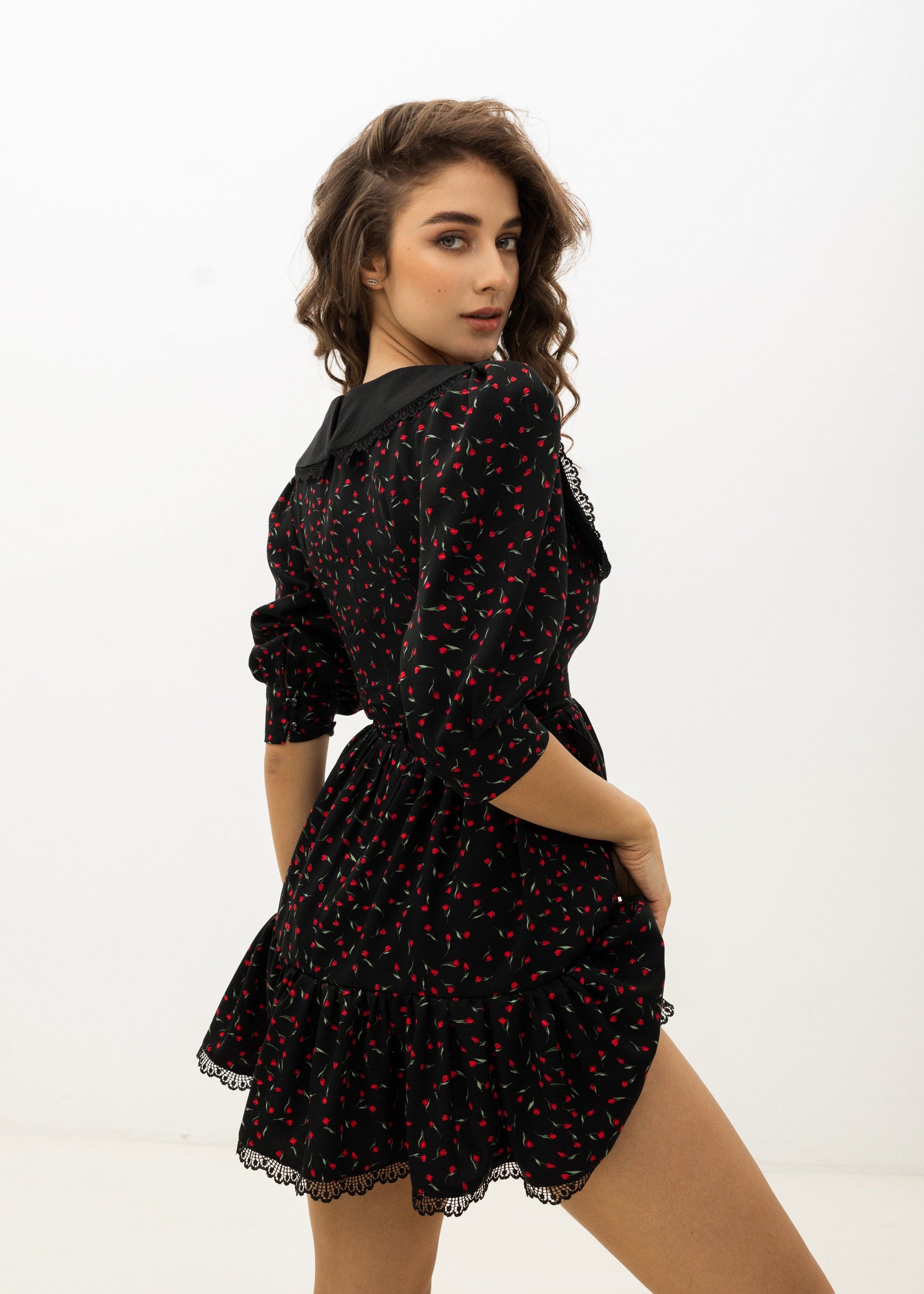 Girl in black floral dress