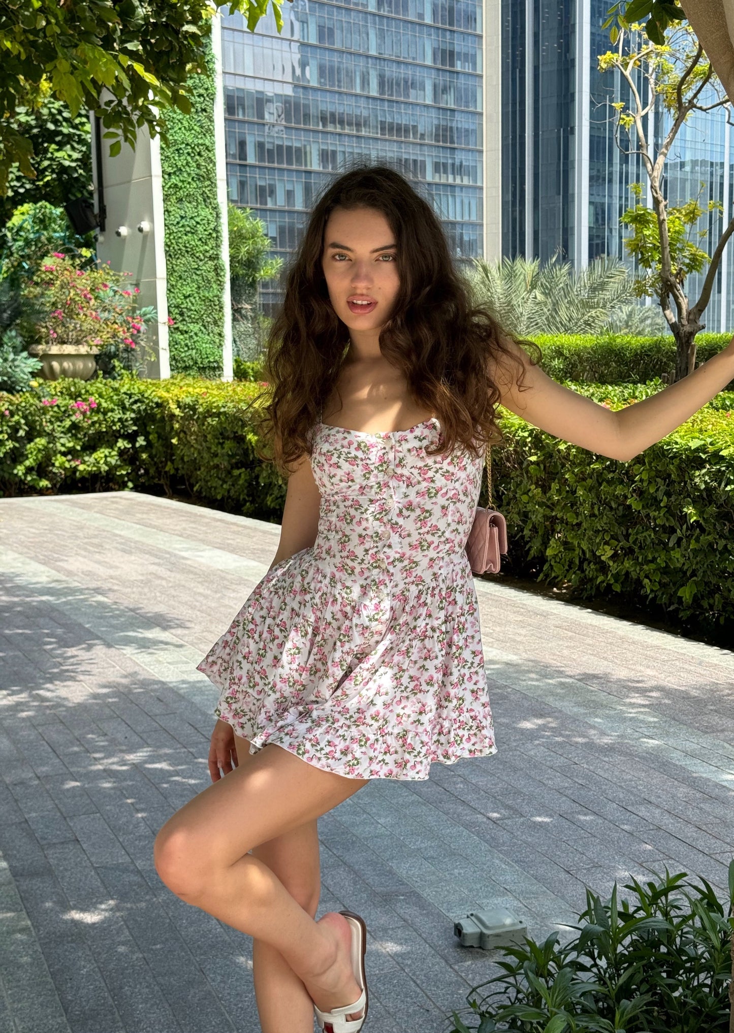 Girl in white dress with floral print