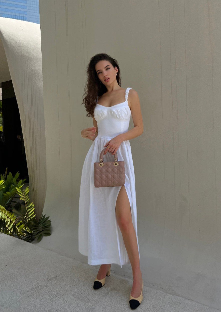 Girl in white linen dress 