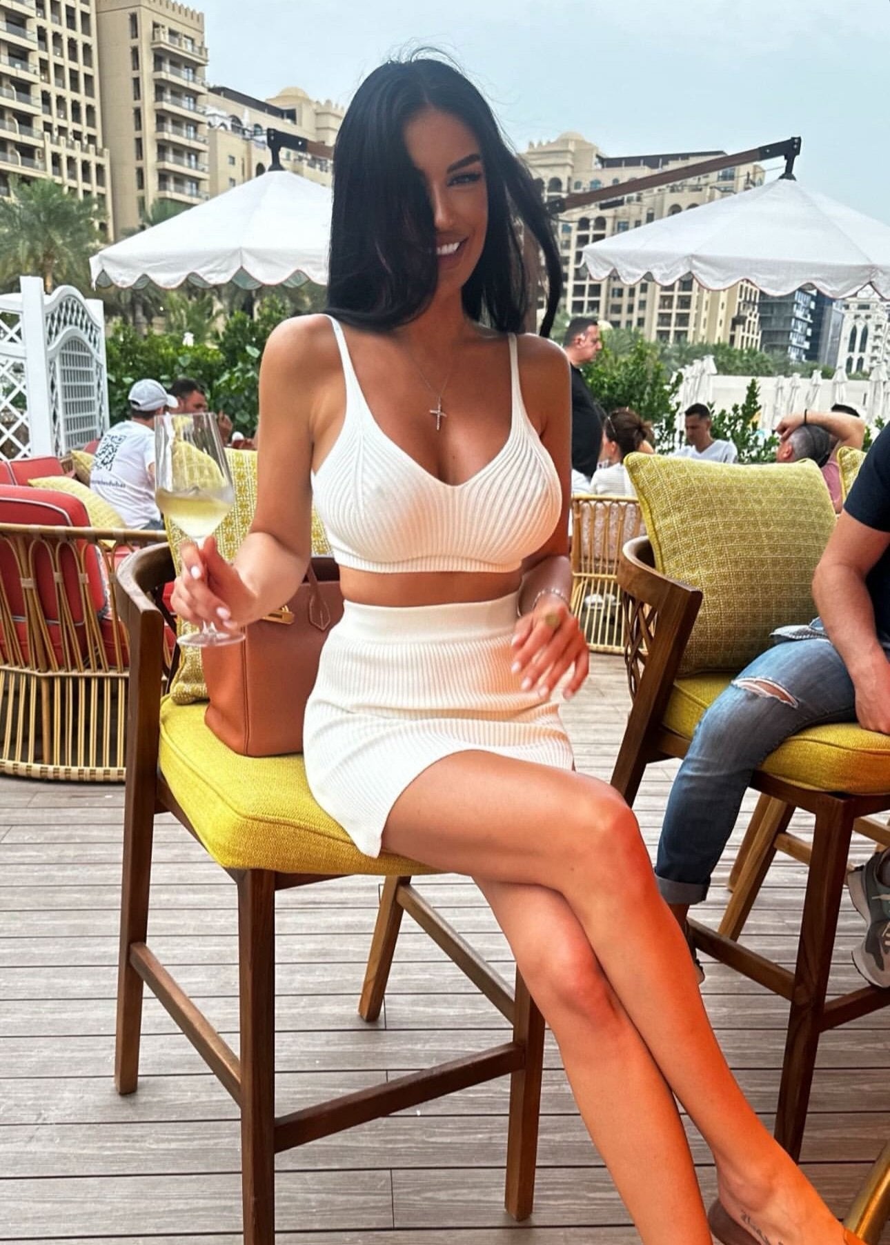 Girl in white suit short skirt and top