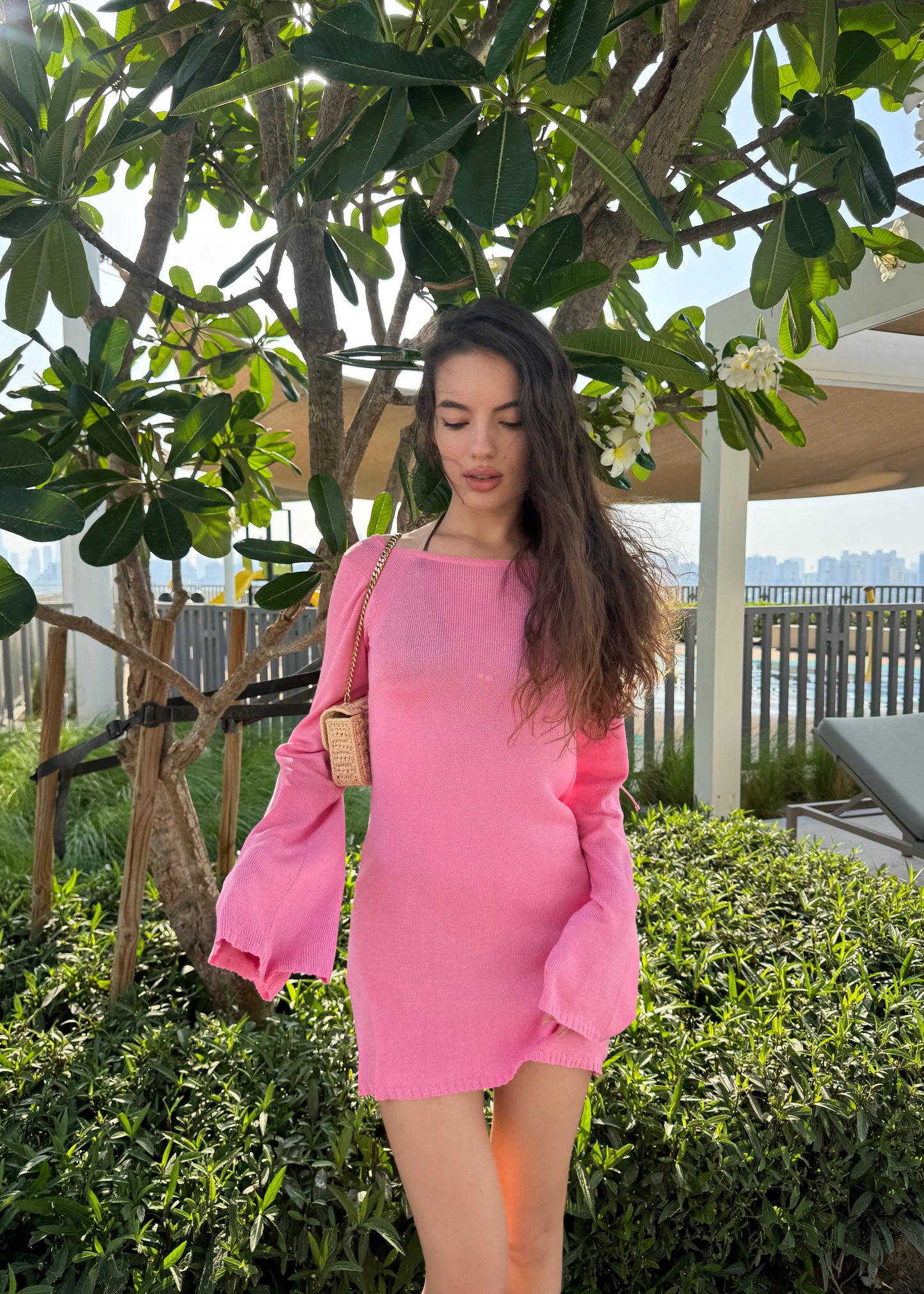 Girl in pink knitted dress