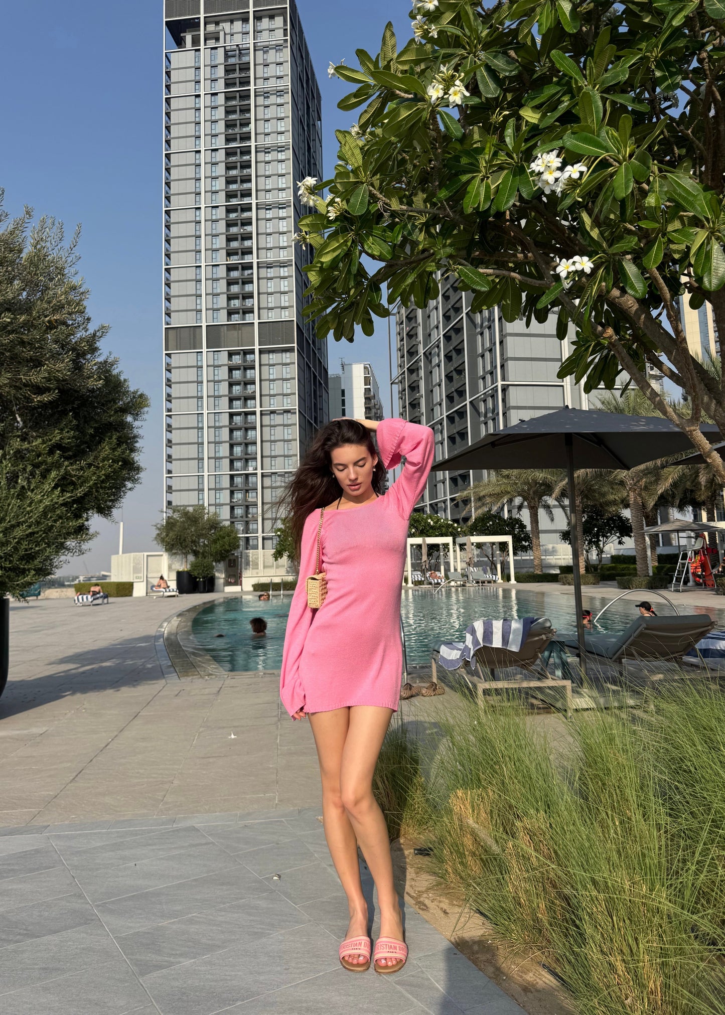 Girl in pink knitted dress