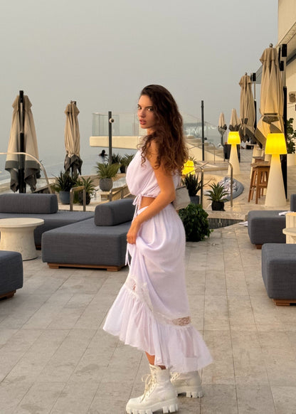 Girl in white chiffon suit with long skirt