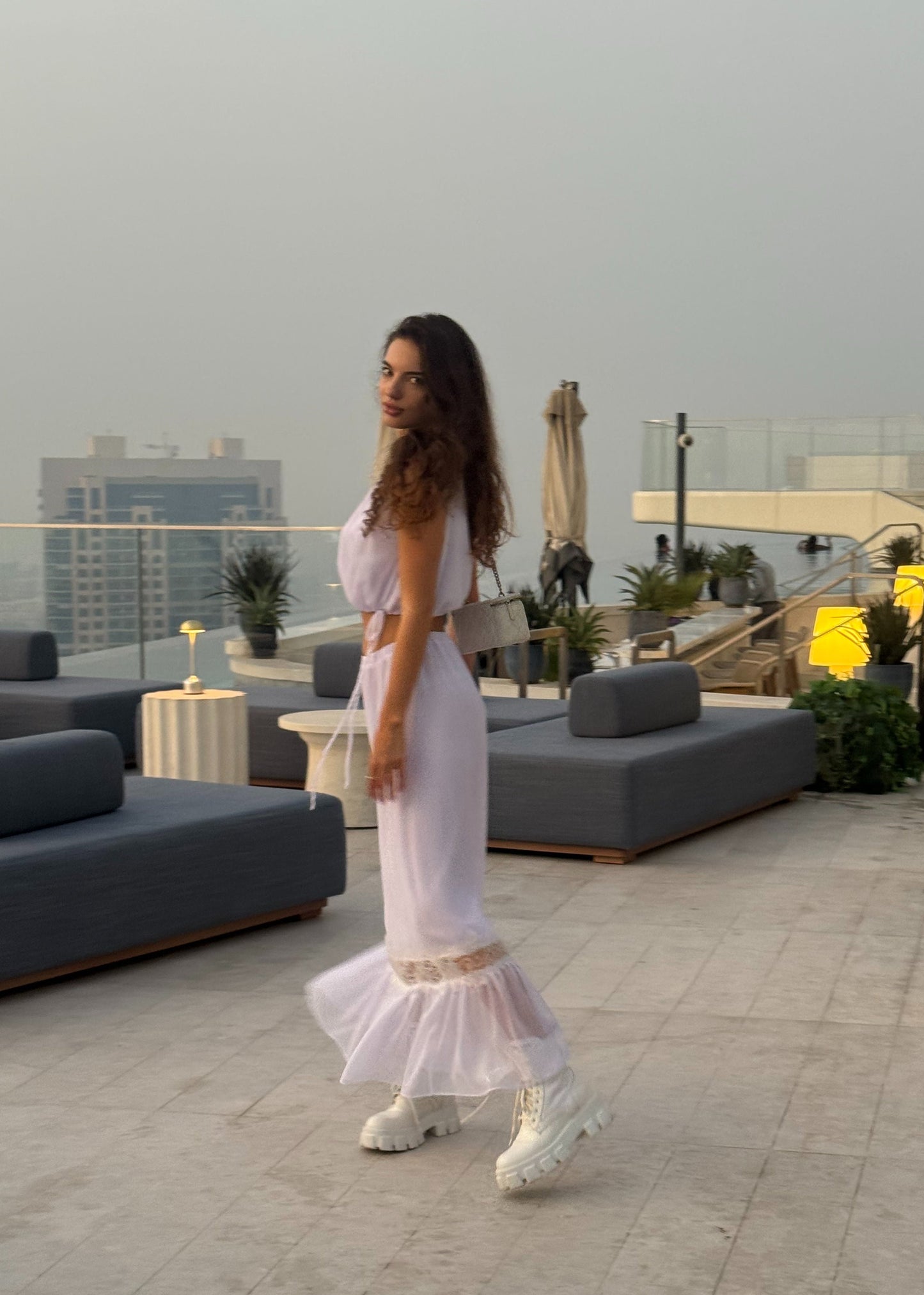 Girl in white chiffon suit with long skirt