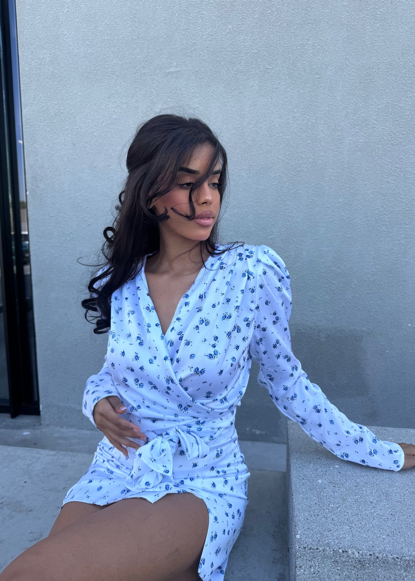 Girl in white floral suit