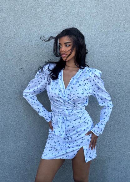 Girl in white floral suit