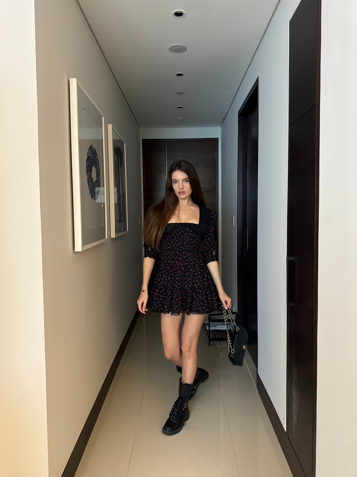 Girl in black floral dress