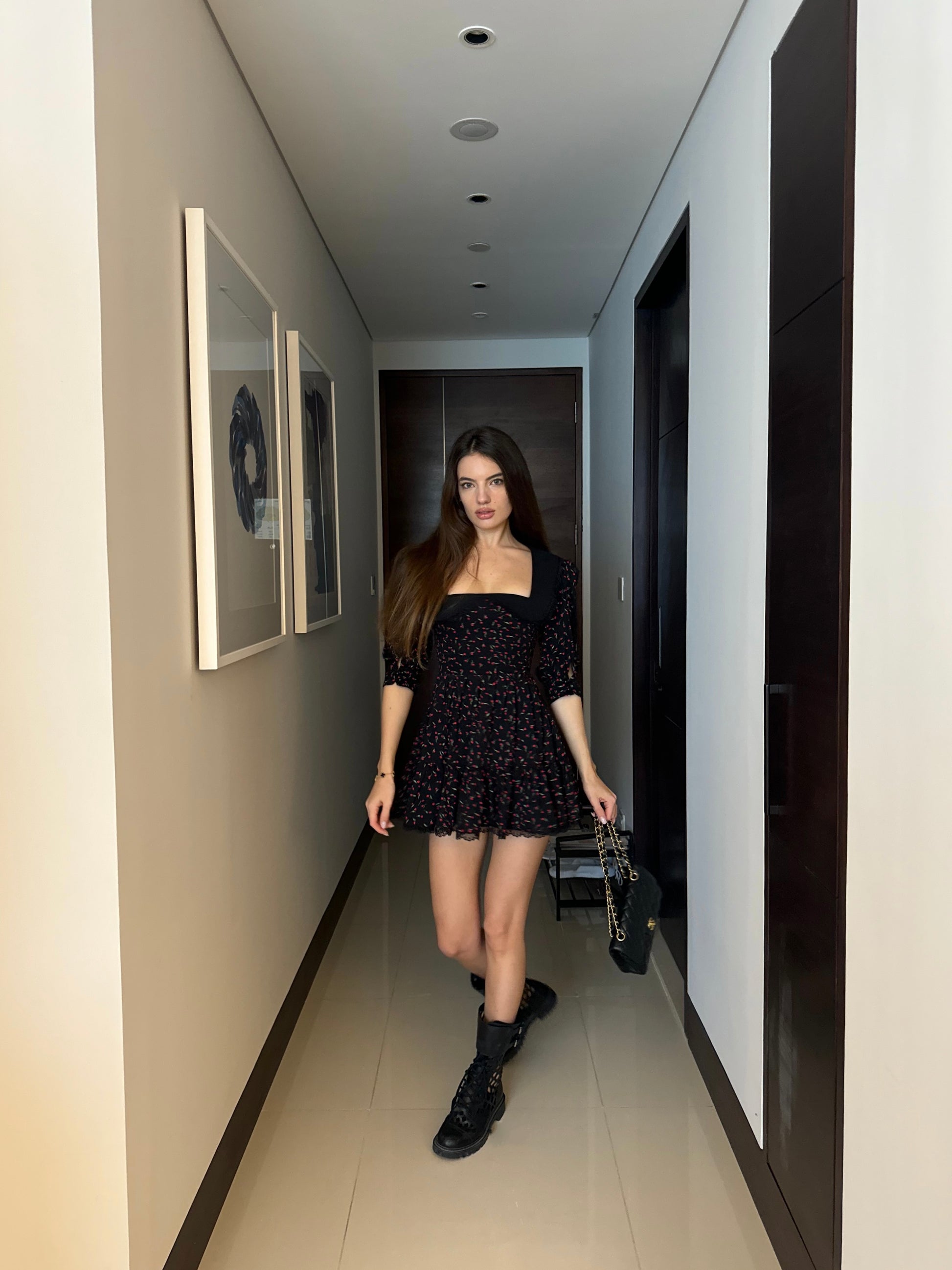 Girl in black floral dress