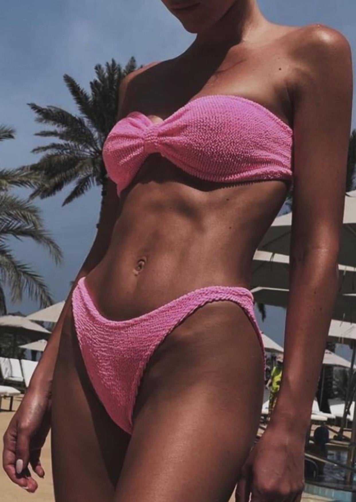 Girl in crinkle bikini Candy pink